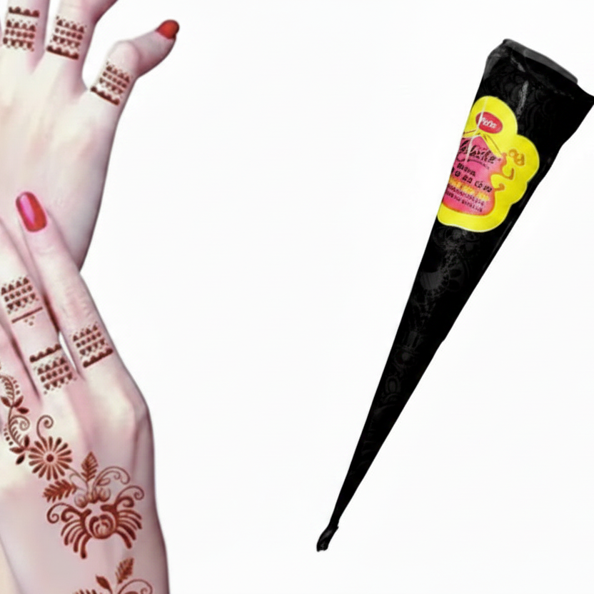 A black cone-shaped henna applicator with a yellow and pink label, shown next to a hand decorated with brown henna designs.